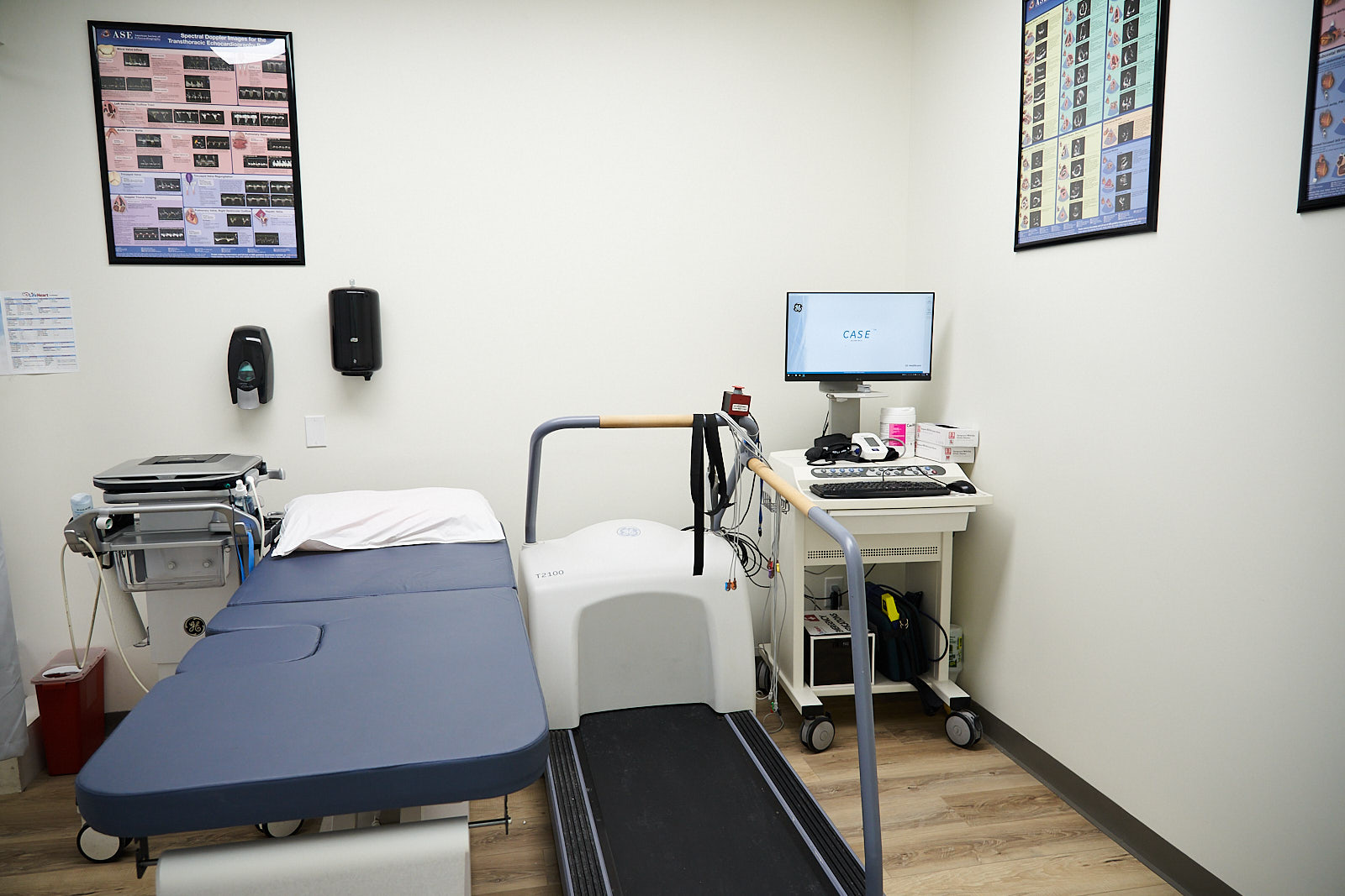 Cardiology room with treadmill stress test and echocardiogram equipment